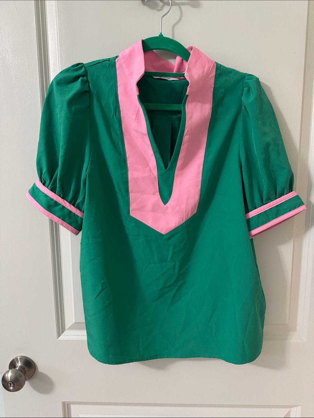 Green Blouse with Pink Trim and V-Neck Detail